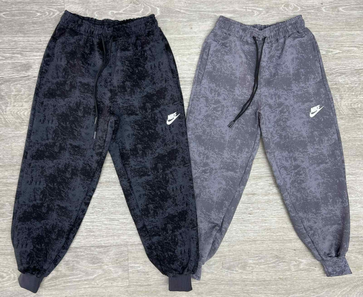 Спортивні штани дитячі Nike м.296-2 (р. 9-13 років) 2 кольори в упаковці 5 штук №756576 - Champion SE829