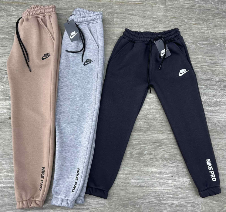 Спортивні штани дитячі Nike трьохнитка пеньє фліс м.1042-2 (р. 9-13 років) 3 кольора в упаковці 5 штук №760001 - Champion SE829
